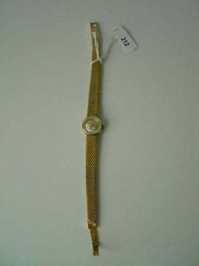 TISSOT, fabrication suisse Montre de dame en or jaune 18k agrémentée d'un bracelet...