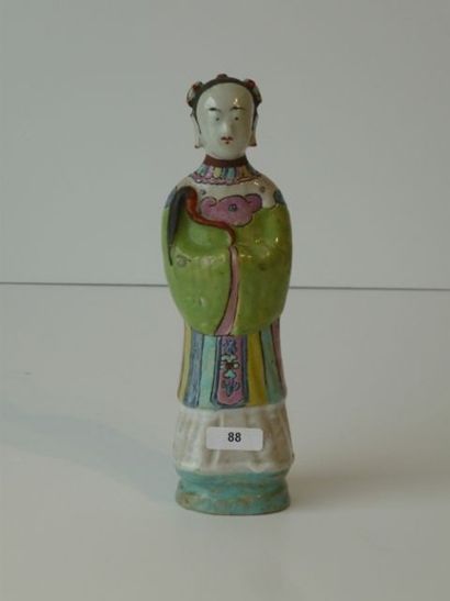 CHINE Personnage en porcelaine à décor polychrome, XIXe, h. 20 cm.