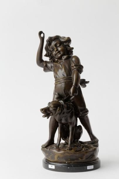 ECOLE FRANCAISE "Garçon et son chien", fin XIXe, groupe en bronze patiné sur socle...