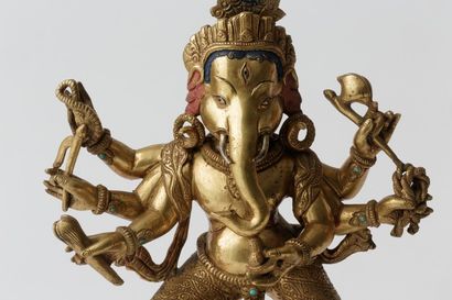 TIBET "Ganesh", XXe, sujet en bronze doré ciselé et partiellement polychromé, h....