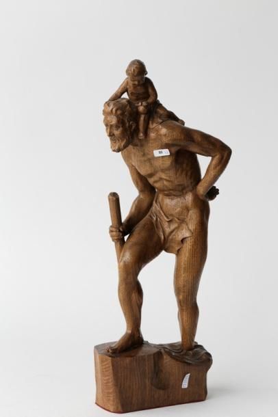 null Ensemble de deux sculptures en chêne :

- "Saint Christophe portant l'Enfant",...