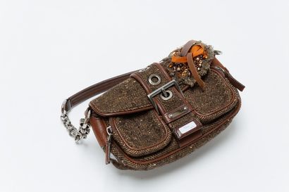 GUCCI Sac "Zèbre" en cuir, l. 35 cm [usures d'usage et taches] et PRADA, petit sac...