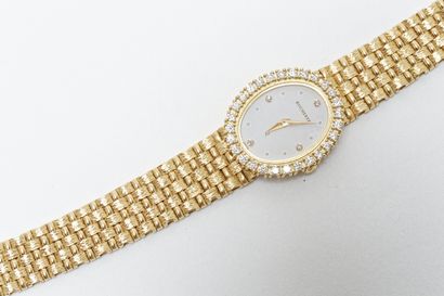 BUCHERER Montre-bracelet de dame en or jaune 18k, cadran ovale serti de brillants,...