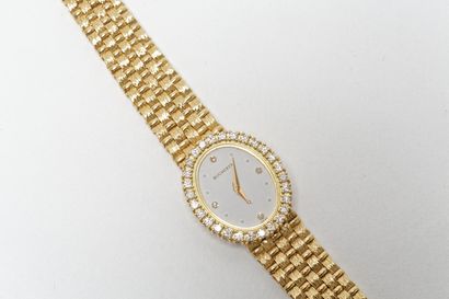 BUCHERER Montre-bracelet de dame en or jaune 18k, cadran ovale serti de brillants,...