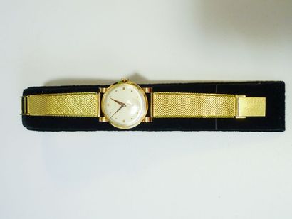 ALTUS Montre-bracelet en or jaune 18k, poinçons, 69 g env. (brut).