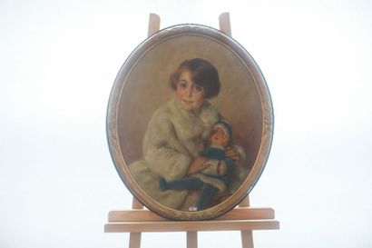GUEQUIER Georges (1878-1957) "Fillette à la poupée", 1929, huile sur toile ovale,...