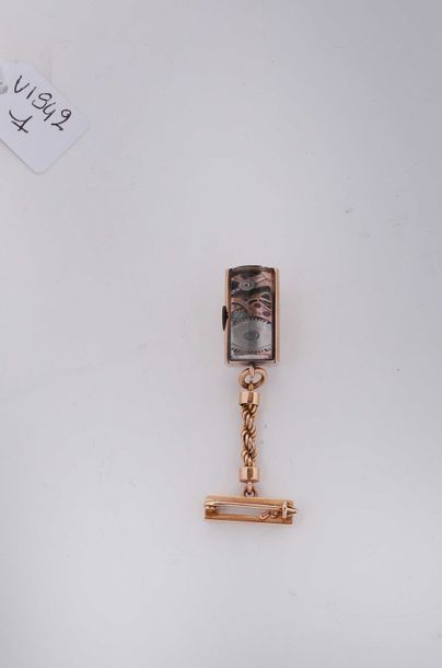 null Montre pendante de dame de forme cylindrique en or le cadran bronzé signé ‘Lehman...