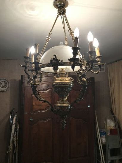 null Two important bronze and gilded brass chandeliers, one with fauna decoratio...