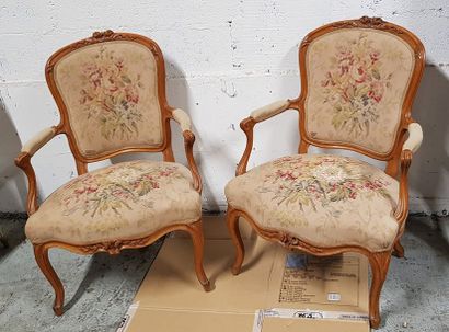 null Pair of convertible armchairs in carved molded fruitwood. Louis XV style .