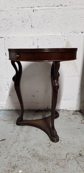 null Tripod circular pedestal table made of veneered wood with swan neck decoration....