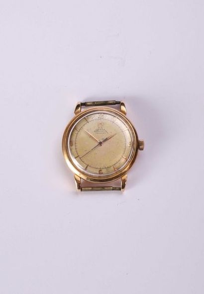 null Omega. Round watch case in 750°/00 gold. Signed two-tone dial, indexes and tree...