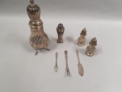 null Lot including a large Mexican silver sprinkler, a pair of silver salt shakers...