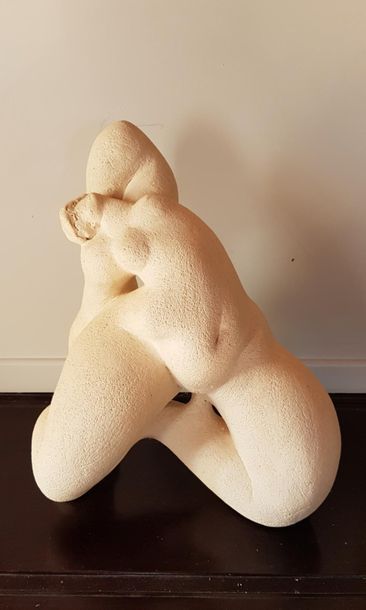 null SEATS ? 
Naked kneeling woman, sculpture signed on one foot on the side. 
H....