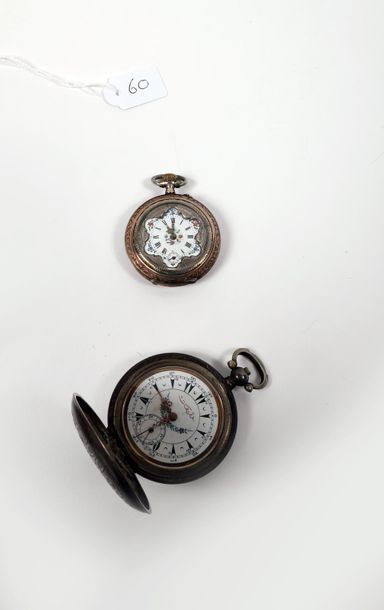 null Two silver watches, one of which has a cylinder with a dial decorated with polychrome...