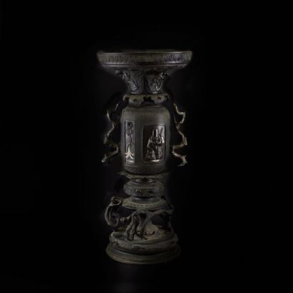 Bronze vase with pavilion neck, finely chiselled...