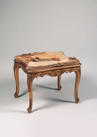 Curious carved and gilded beech stool of...