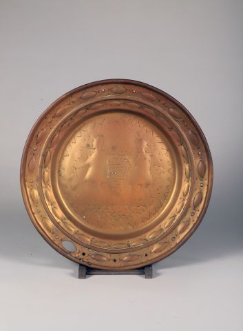 Quest or offering dish, circular in embossed...