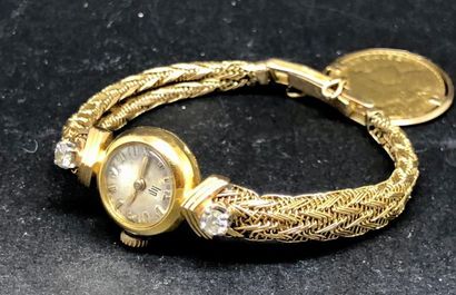 null Montre de dame en or jaune 18K (750 °/°°), le cadran rond est signé LIP et numéroté...