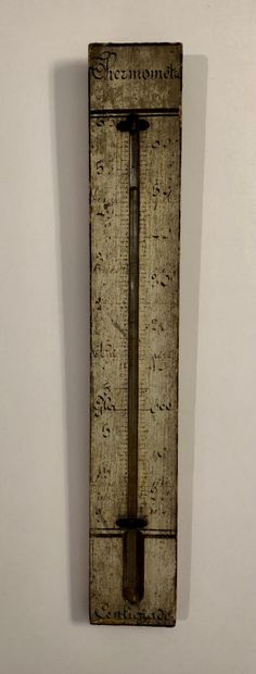 null Deux thermomètres centigrades montés sur bois. 32.5cm 17cm.