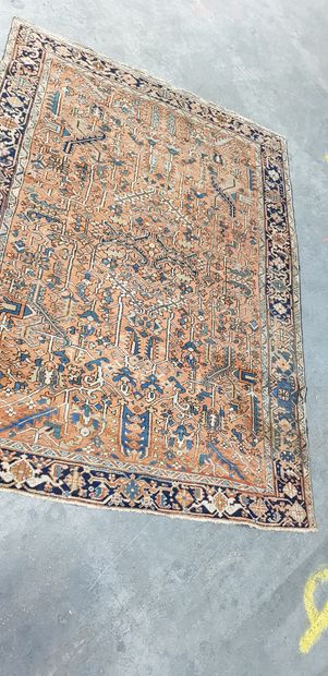 null PERSAN RUG

Heriz, 20th century

Pale pink field and midnight blue border

320...