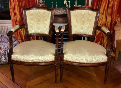 null Pair of armchairs with "Chapeau de gendarme" backs, fluted and tapered legs...