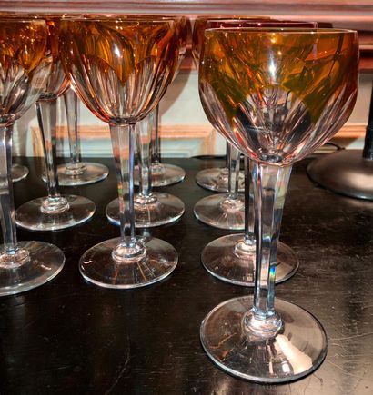 null GLASSES

Suite of 13 Rhine wine glasses in cut crystal with orange lining, 

green...