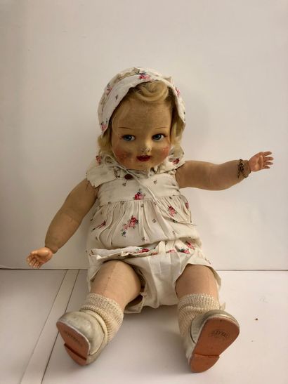 null 7 pieces including :

- 1 RAYNAL type doll, head in felt, body in fabric and...