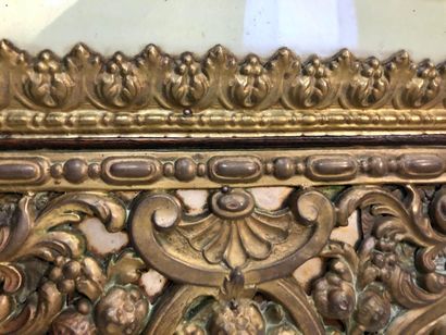 null Rectangular bevelled mirror in a frame imitating repoussé bronze, with acorns...