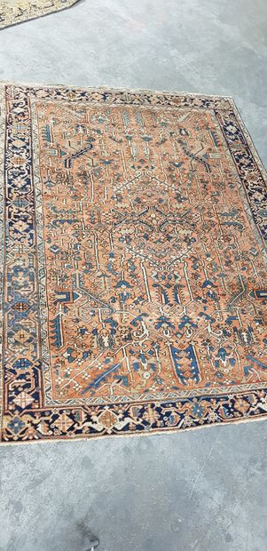 null PERSAN RUG

Heriz, 20th century

Pale pink field and midnight blue border

320...