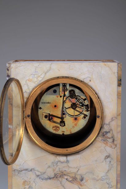 null Yellow marble terminal clock, probably Sienna, the white enamelled dial, hours...