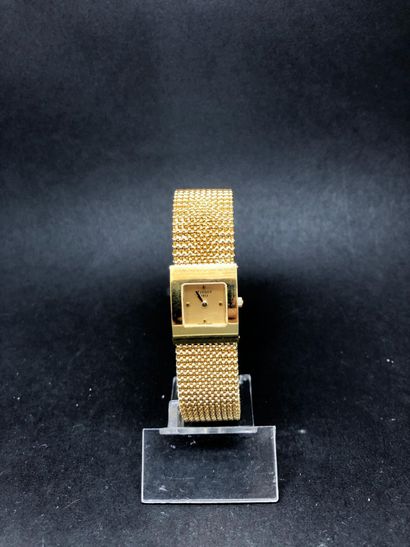 null Montre-bracelet en or jaune étranger 18K (750°/°°).

Boîtier rectangulaire bombé,...