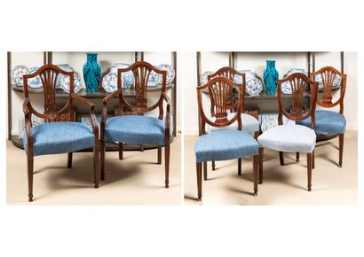  Suite of 4 chairs and a pair of armchairs 
in mahogany veneer with escutcheon backs,...
