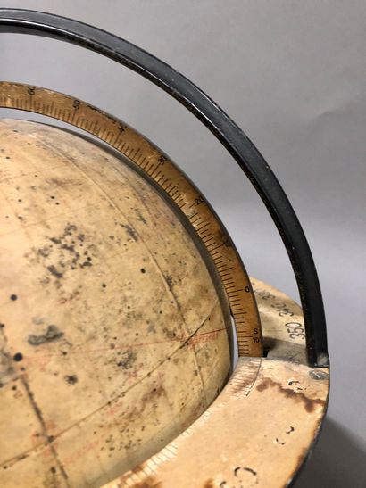 null Celestial globe by Dietrich Reimer in a circular iron and paper frame, mounted...