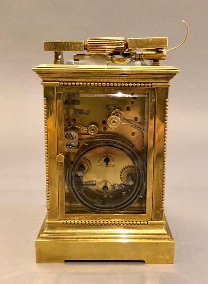null A very solid ormolu travel clock with a large bell for the English market. H....