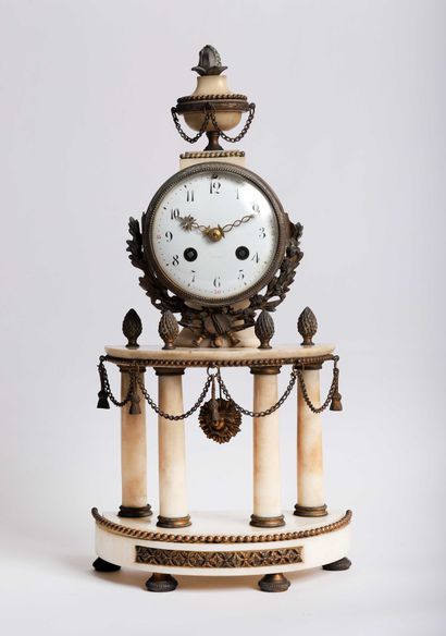 null White marble mantel clock, the movement mounted on a platform supported by four...