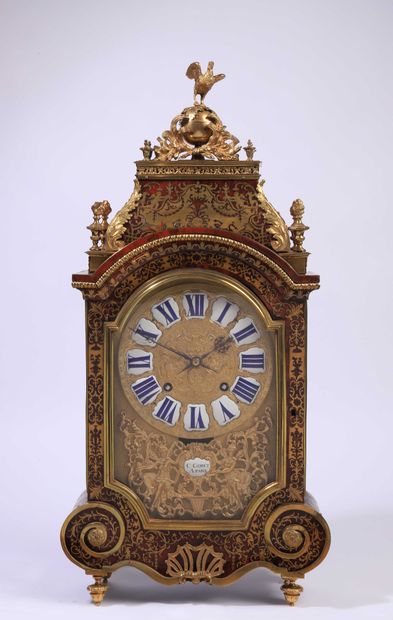 A mantel clock with hour and a half striking...