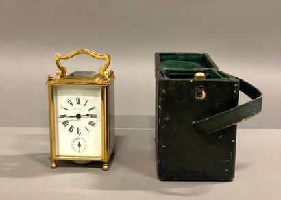 null Travelling alarm clock with anchor escapement signed 'Paul Garnier'. Height...