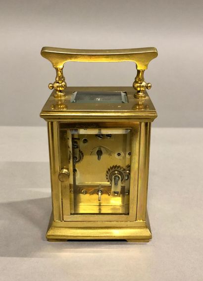 null Small travel alarm clock with cylinder escapement. H.8.7cm.