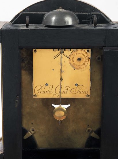 null A mantel clock with hour and a half striking signed (dial and movement), 'Charles...