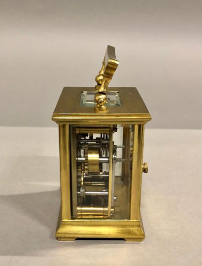 null Small travel alarm clock with cylinder escapement. H.8.7cm.