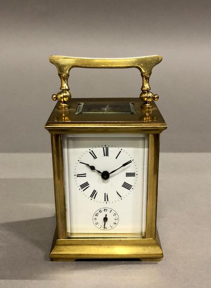 Small travel alarm clock with cylinder escapement....