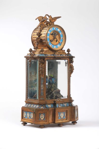 null An automaton singing bird mantel clock, striking at the half-hour mark, signed...