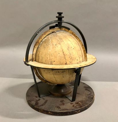 null Celestial globe by Dietrich Reimer in a circular iron and paper frame, mounted...