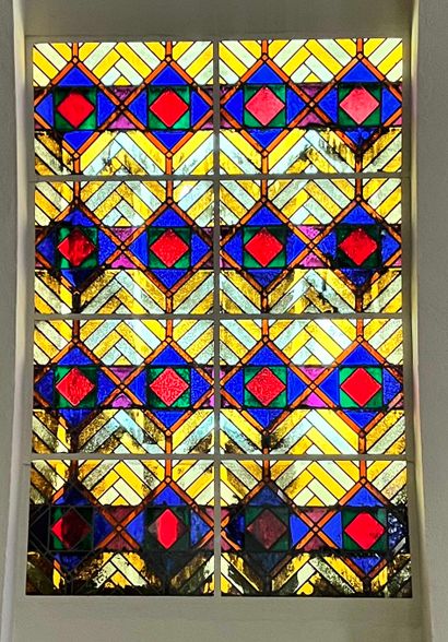  Apse 
Two rectangular stained glass windows 
Geometric decoration of rhombuses and...