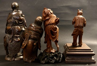 null Quatre statuettes en bambou, représentant Li Tieguai, un enfant et deux immortels...