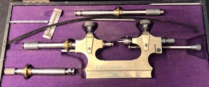 A swivel lathe in its case with bow and ...