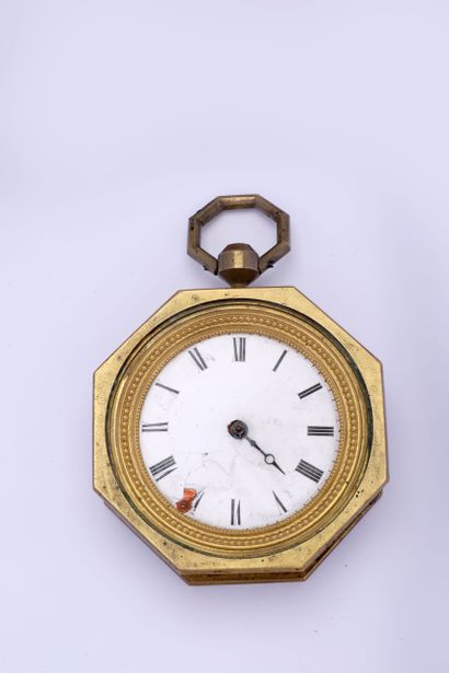null Gilt brass octagonal carriage or alcove watch, circa 1810.

White enamel dial...