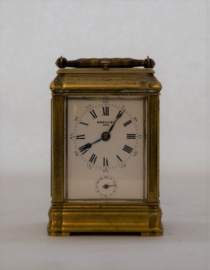 Small travel clock with large and small chimes...