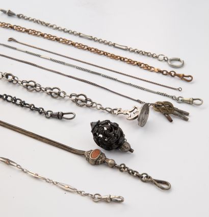 Eight watch chains, one with a silver seal,...