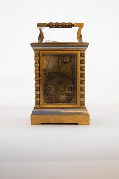  Bronze and gilt brass travel clock with passage striking and repeater, the movement...